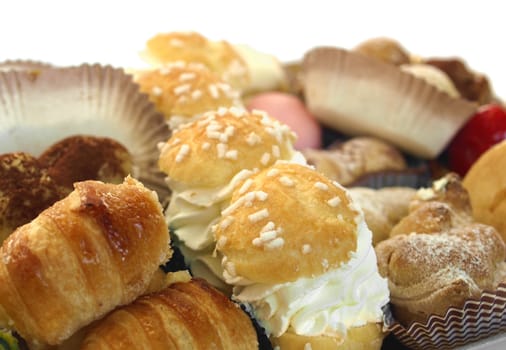 Mixed pastries with chocolate, cream, fruit