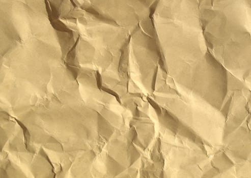 Sheet of brown and rippled paper background