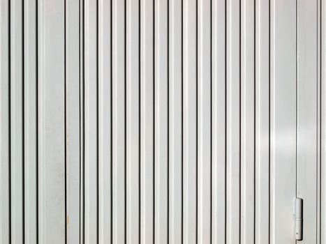 Detail of industrial steel metal door background