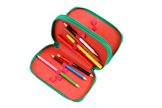 On a white background felt-tip pens and pencils in a case