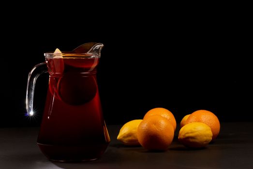 Still life, pitcher with Spanish sangria and fruit