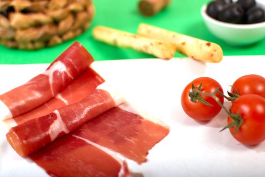 Spanish serrano ham served with garnish