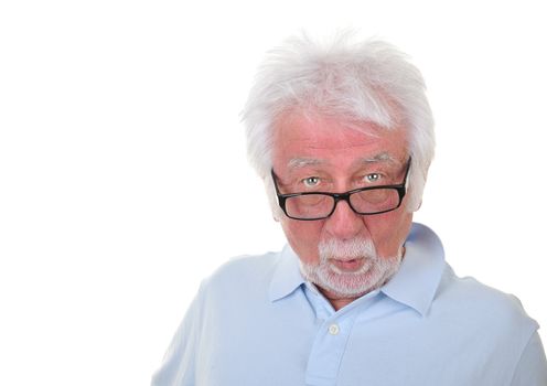 Portrait of an elderly man with a surprised expression on a white background.