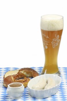 Bavarian veal sausage with mustard, pretzel and beer