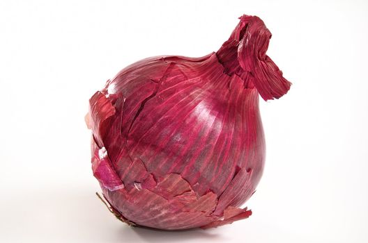 red onion with papery skin
