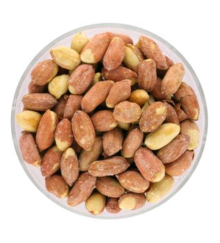 Roasted peanuts in bowl isolated in white