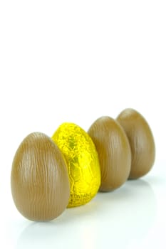 Chocolate easter eggs isolated against a white background