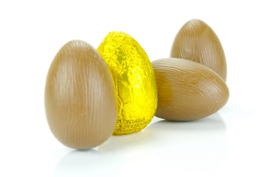Chocolate easter eggs isolated against a white background