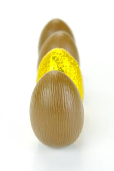 Chocolate easter eggs isolated against a white background