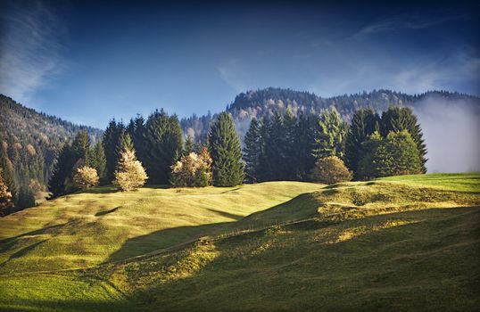 An image of a beautiful landscape with fog in bavaria germany