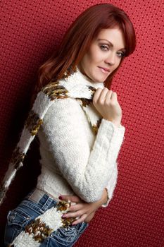 Beautiful redhead winter scarf woman