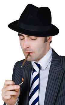 retro businessman light a cigarette isolated over white with clipping path