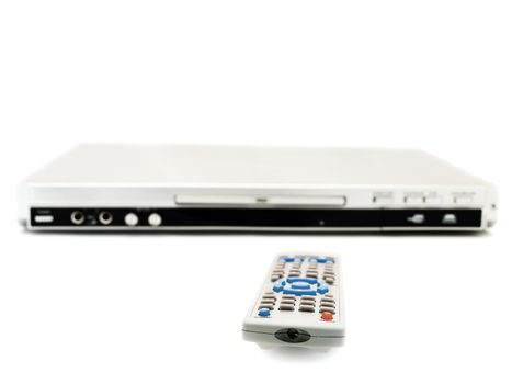 remote control and dvd player over the white background