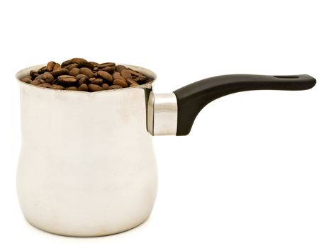 phorto of Turkish percolator  with coffee beans over the white background