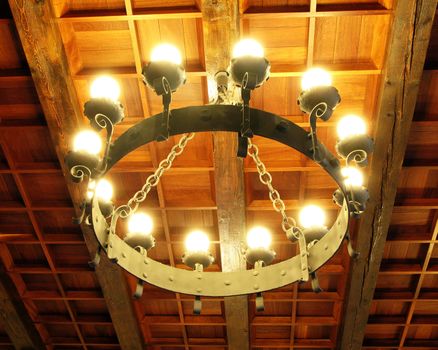 Antique stile wrought iron chandelier.