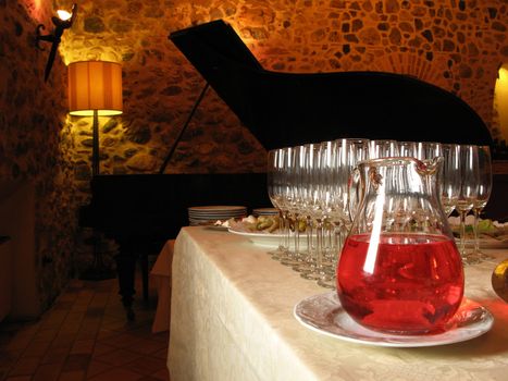 Cocktail aperitif in a restaurant with piano.
