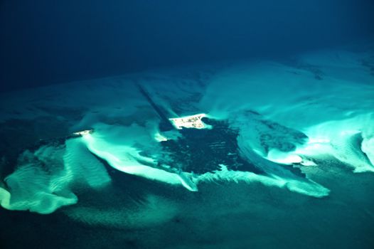 white sand islands in the middle of the ocean