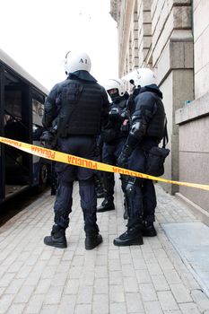 Riga, Latvia, March 16, 2009. Riot police before Commemoration of the Latvian Waffen SS unit or Legionnaires.The event is always drawing crowds of nationalists and anti-fascists. Many Latvians legionnaires were forcibly called uo to join the Latvian SS Legion.