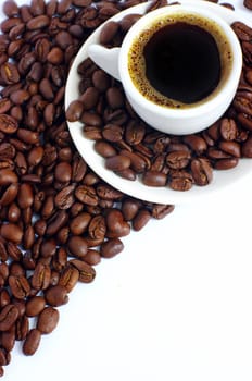 Coffee cup and grain on white