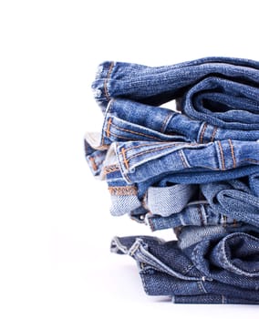 Stack of Blue Jeans isolated over white