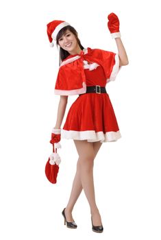 Asian beauty in Santa Claus dress with bag posing against white background.