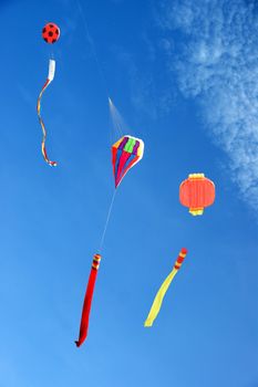 Colorful kites flying in the sky