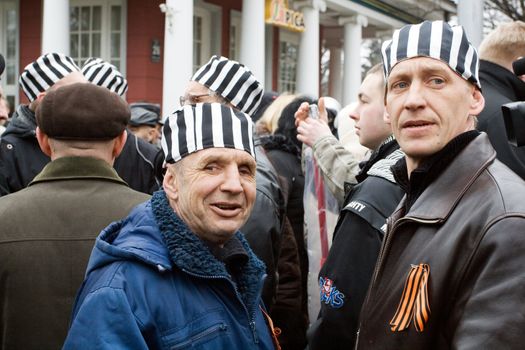 Riga, Latvia, March 16, 2009. Protestors of Commemoration of the Latvian Waffen SS unit or Legionnaires.The event is always drawing crowds of nationalist supporters and anti-fascist demonstrators. Many Latvians legionnaires were forcibly called uo to join the Latvian SS Legion.
