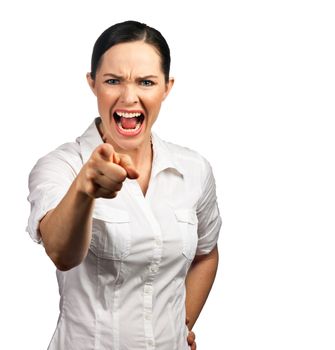 An isolated portrait of an angry business woman or boss screaming and pointing her finger