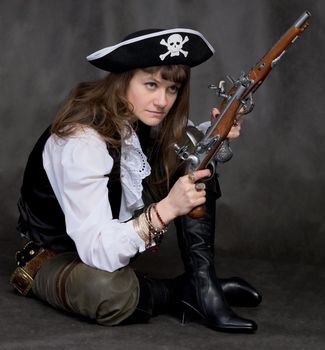 Girl - pirate on black with two pistols in hands