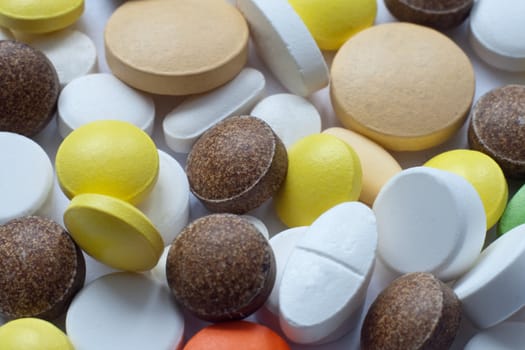 Lot of different medicine pills 
