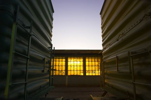 Sunset between two rail cars in Lincoln, Nebraska