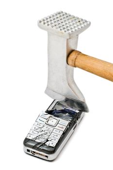 Meat tenderizer smashing cellular phone isolated on the white background