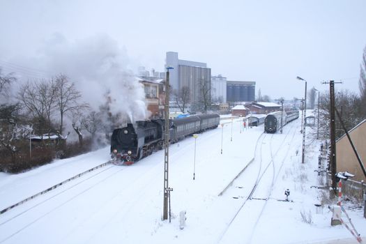 Old retro steam train stopped at the station