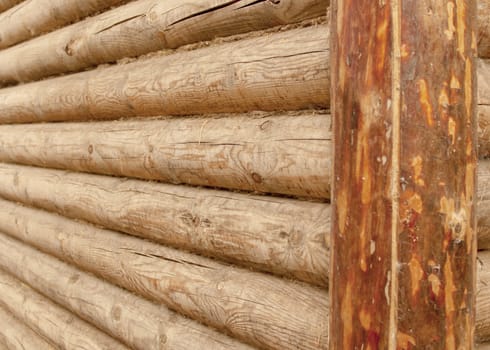 fragment of a wall of a old wooden house