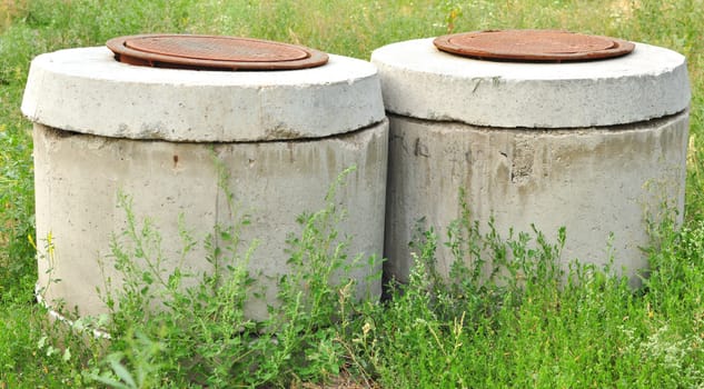 Two stone wells on city water supply