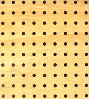 wooden board with apertures on white background