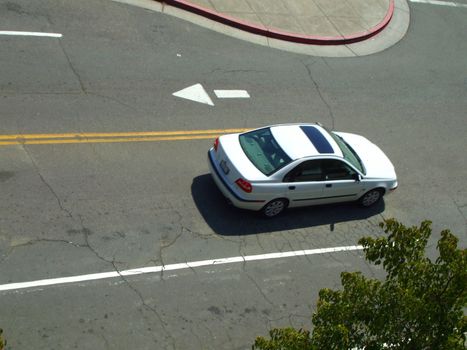 White sports car Volvo S40 on a highway.