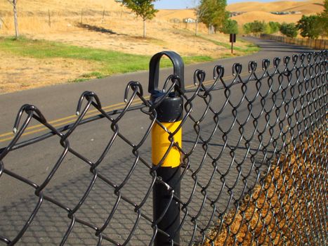 Close up of a chain link fence showing unique pattern.