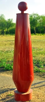 column a conical shape on the background of nature