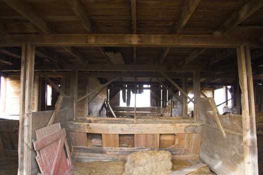 Fragment of farm barn with maize soy and wheat fields  