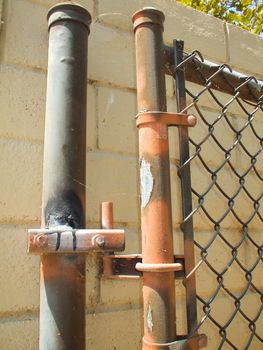 Close up of a chain link fence showing unique pattern.