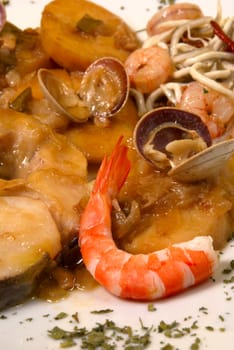 Hake served with seafood and cider sauce