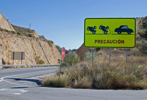 Peculiar road sign warning too fast bikers