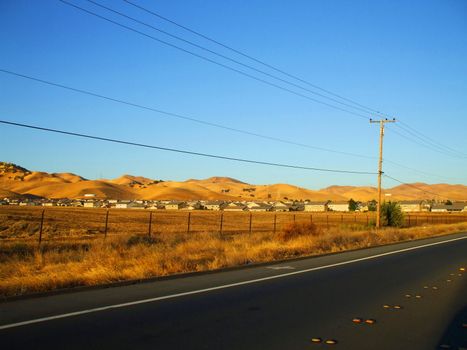 Group of houses in a horizon on a sunny day.