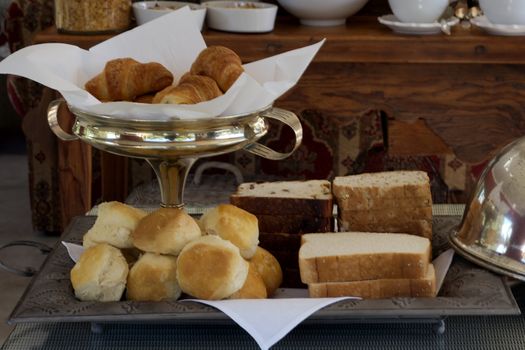 Breakfast breads and scones with silver trays