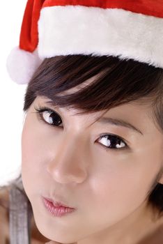 Cute Christmas woman of Asian with Santa Claus hat.