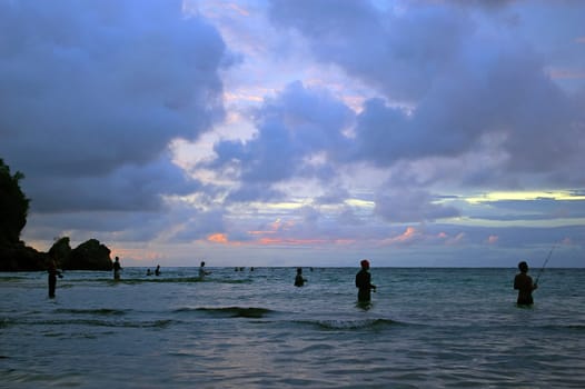 Fishing in the Indian Ocean, Padang beach, Bali, Indonesia.