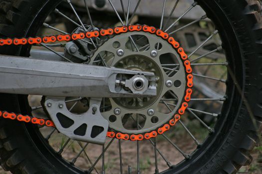 Chain and sprocket of a motocross bike