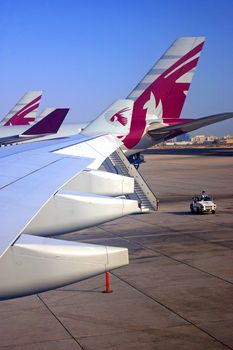 Qatar airways planes at Doha international airport, Doha, Qatar.