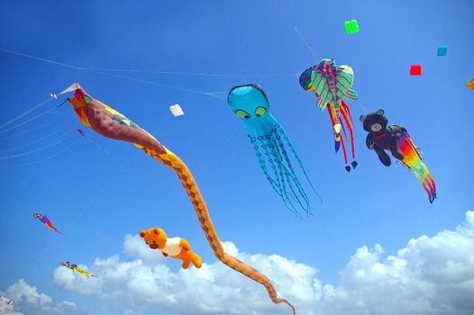 Creative kites being flown at the Sanur beach games, Sanur, Bali, Indonesia.